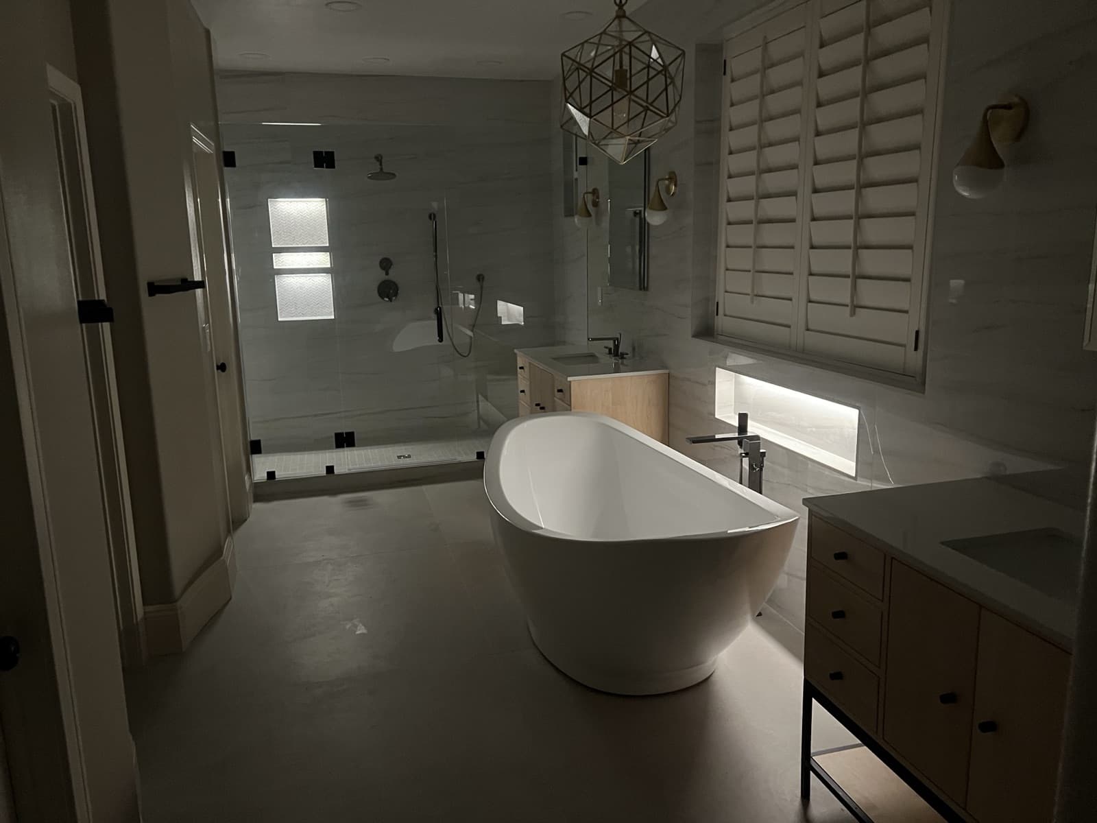 Finished primary bathroom remodel by I.H. Restoration