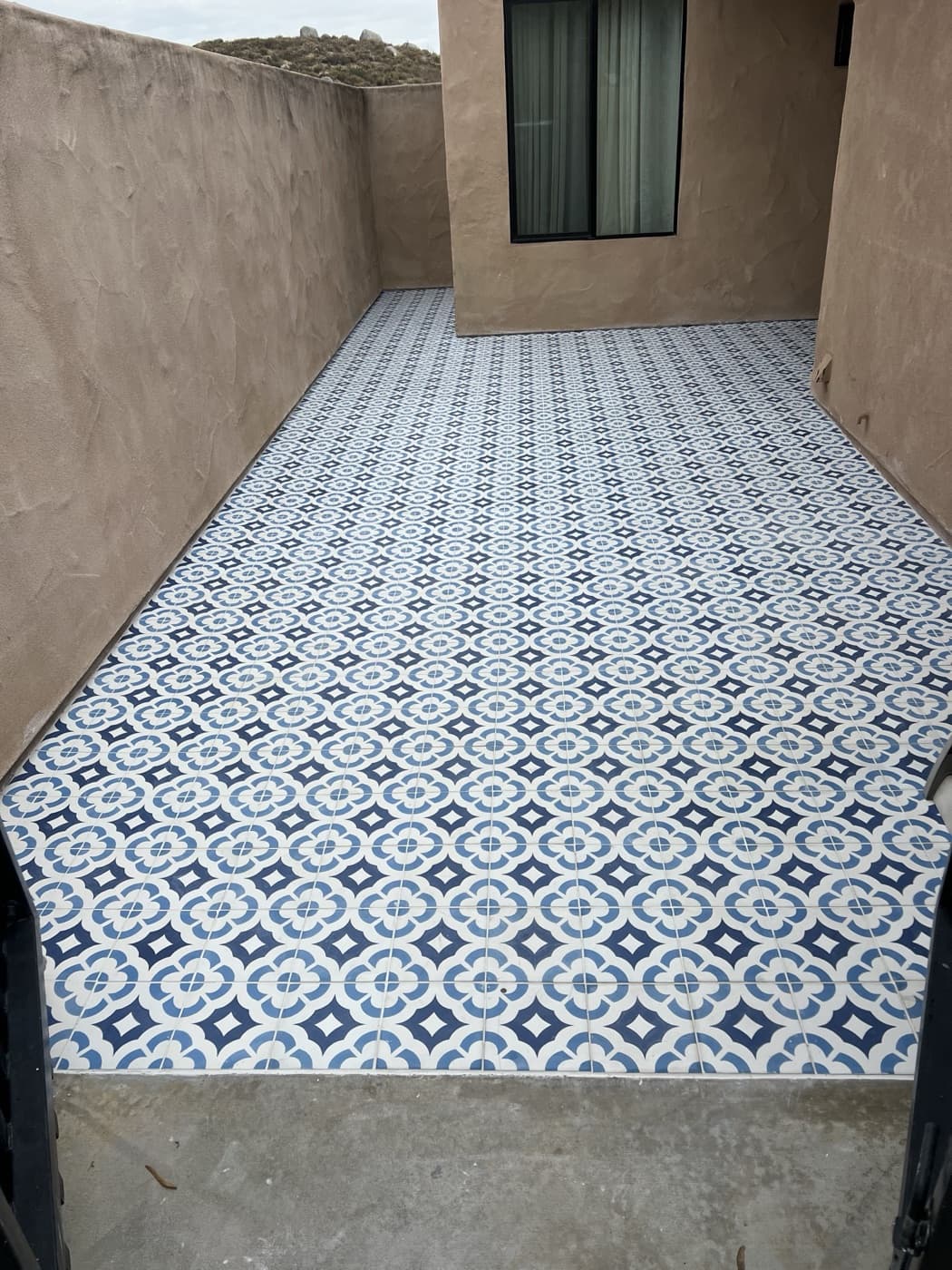 Finished patterned tile patio